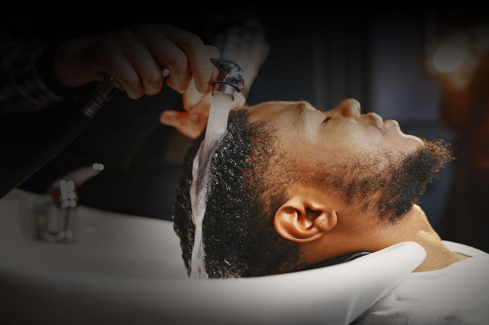 Coiffure avec lavage réalisée chez Christian Cutz, barbier à Préfontaine, Montréal